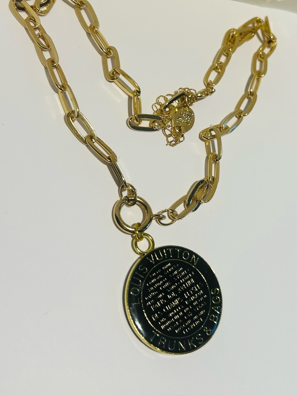 Gold-Tone Chain Necklace with Black Logo Medallion